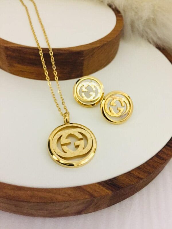 Gucci Stainless Steel Pendant & Earing Set